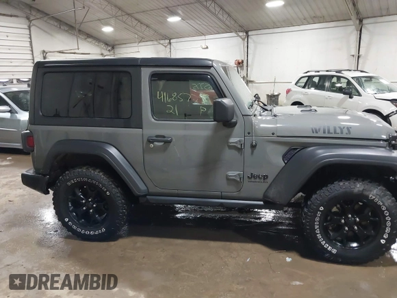 2021 Jeep Wrangler Sport S with VIN 1C4GJXAN7MW647786, listed as a IAAI auction lot 41685775 with 31,907 mi miles and . Bid and sale history available at DreamBid. Image 13.
