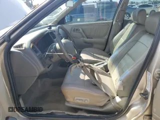 2002 Infiniti G20 Luxury z VIN JNKCP11A12T501940, wystawiony jako Copart lot #74041014 z przebiegiem Nie podano mil oraz Szkody całkowita. Historia ofert i sprzedaży dostępna na DreamBid. Obrazek 7.