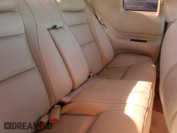2000 Cadillac Eldorado z VIN 1G6EL12Y0YB702117, wystawiony jako Copart lot #80297854 z przebiegiem 124 851 mil mil oraz Szkoda całkowita • Salvage title. Historia ofert i sprzedaży dostępna na DreamBid. Obrazek 10.
