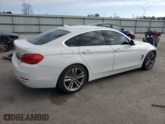 2016 BMW 4 Series 428i with VIN WBA4A9C57GGL87882, listed as a Copart auction lot 84609184 with 139,959 mi miles and Salvage title. Bid and sale history available at DreamBid. Image 3.
