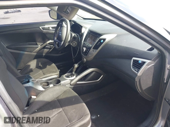 2013 Hyundai Veloster w/Black Int with VIN KMHTC6AD6DU169765, listed as a IAAI auction lot 41928516 with 130,708 mi miles and . Bid and sale history available at DreamBid. Image 5.