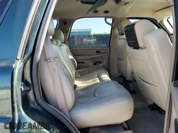 2004 Chevrolet Tahoe LS z VIN 1GNEC13Z24R174609, wystawiony jako Copart lot #52234105 z przebiegiem 182 306 mil mil oraz Szkoda całkowita • Salvage title. Historia ofert i sprzedaży dostępna na DreamBid. Obrazek 11.