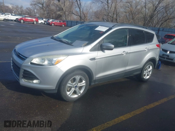 2014 Ford Escape SE with VIN 1FMCU9GX9EUB98758, listed as a IAAI auction lot 41717257 with 126,358 mi miles. Bid and sale history available at carsss.com. Image 2.