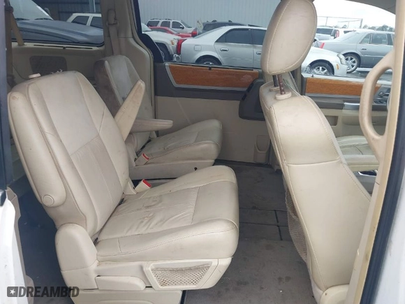 2010 Chrysler Town & Country Limited with VIN 2A4RR6DX1AR141930, listed as a IAAI auction lot 41557272 with NaN miles. Bid and sale history available at carsss.com. Image 8.