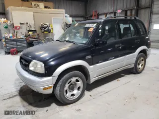 2000 Suzuki Grand Vitara JLX with VIN JS3TD62VXY4125624, listed as a Copart auction lot 87957045 with 175,923 mi miles and Salvage Title. Bid and sale history available at carsss.com. Image 1.