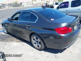 2013 BMW 5 Series 528i with VIN WBAXG5C58DD232582, listed as a IAAI auction lot 41890082 with 150,401 mi miles and . Bid and sale history available at carsss.com. Image 3.