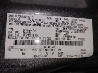 2014 Ford Focus SE with VIN 1FADP3F28EL285971, listed as a IAAI auction lot 41290979 with 149,900 mi miles. Bid and sale history available at carsss.com. Image 9.