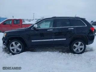 2011 Jeep Grand Cherokee Overland with VIN 1J4RR6GT5BC604784, listed as a IAAI auction lot 41515626 with 66,654 mi miles. Bid and sale history available at carsss.com. Image 15.