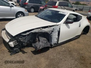 2014 Nissan 370Z with VIN JN1AZ4EH2EM631397, listed as a Copart auction lot 65758844 with 0 mi miles and Salvage Title. Bid and sale history available at carsss.com. Image 1.