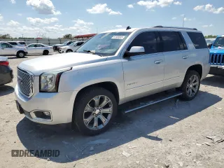 2015 GMC Yukon Denali z VIN 1GKS1CKJ2FR305330, wystawiony jako Copart lot #61568835 z przebiegiem 196 832 mil mil oraz Czysty tytuł • Clean title. Historia ofert i sprzedaży dostępna na DreamBid. Obrazek 1.