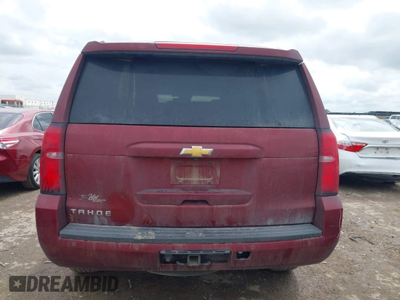2016 Chevrolet Tahoe LT with VIN 1GNSCBKCXGR329921, listed as a IAAI auction lot 41915654 with 273,945 mi miles and . Bid and sale history available at DreamBid. Image 16.