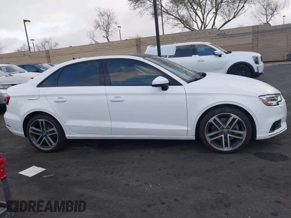 2019 Audi A3 Premium with VIN WAUAUGFF3KA101038, listed as a IAAI auction lot 41878582 with 61,726 mi miles and . Bid and sale history available at DreamBid. Image 13.