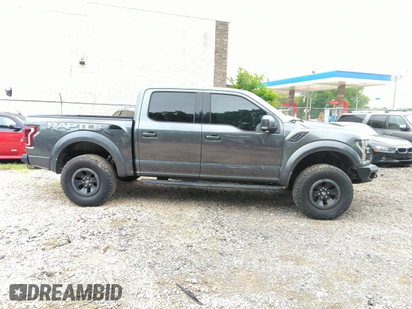 2017 Ford F-150 Raptor with VIN 1FTFW1RG8HFA31164, listed as a IAAI auction lot 42125542 with 164,745 mi miles and . Bid and sale history available at carsss.com. Image 13.