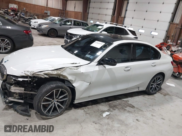 2019 BMW 3 Series 330i xDrive with VIN WBA5R7C55KAJ83482, listed as a IAAI auction lot 41565321 with 126,536 mi miles. Bid and sale history available at carsss.com. Image 14.