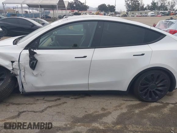 2022 Tesla Model Y Performance with VIN 7SAYGDEF0NF400560, listed as a IAAI auction lot 41783912 with 36,513 mi miles and . Bid and sale history available at DreamBid. Image 14.