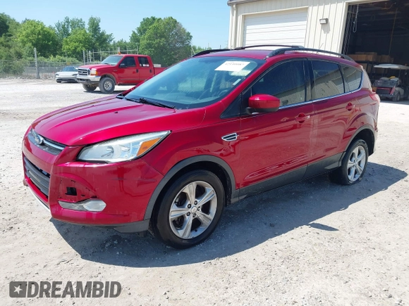 2013 Ford Escape SE with VIN 1FMCU0GX6DUB30766, listed as a IAAI auction lot 42140087 with 200,188 mi miles and . Bid and sale history available at carsss.com. Image 2.