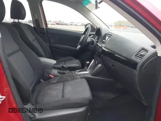 2015 Mazda CX-5 Sport z VIN JM3KE2BE9F0452625, wystawiony jako IAAI lot #42114867 z przebiegiem 167 849 mil mil oraz . Historia ofert i sprzedaży dostępna na DreamBid. Obrazek 5.