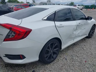 2019 Honda Civic Sport with VIN 19XFC2F85KE019311, listed as a IAAI auction lot 42319241 with 163,241 mi miles and . Bid and sale history available at DreamBid. Image 18.