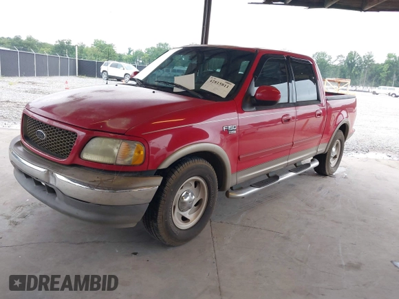 2003 Ford F-150 XLT with VIN 1FTRW07L13KD50168, listed as a IAAI auction lot 42815811 with Not provided miles and . Bid and sale history available at DreamBid. Image 2.