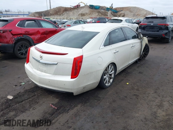 2013 Cadillac XTS with VIN 2G61N5S32D9114767, listed as a IAAI auction lot 41726593 with 70,572 mi miles. Bid and sale history available at carsss.com. Image 4.