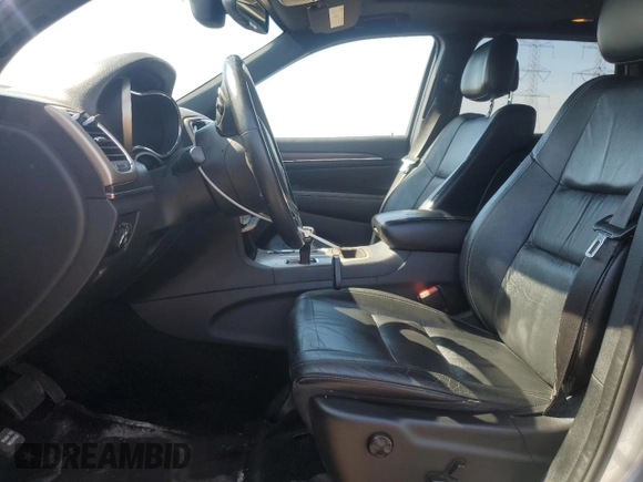 2014 Jeep Grand Cherokee Limited with VIN 1C4RJEBG4EC157449, listed as a Copart auction lot 54673485 with 213,079 mi miles and Clean Title. Bid and sale history available at carsss.com. Image 7.