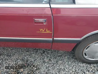 1989 Chrysler LeBaron z VIN 1C3XJ45J8KG223051, wystawiony jako Copart lot #75115464 z przebiegiem 27 923 mil mil oraz Szkody całkowita. Historia ofert i sprzedaży dostępna na DreamBid. Obrazek 12.