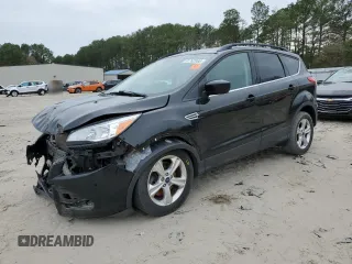 2016 Ford Escape SE with VIN 1FMCU9GX5GUB02417, listed as a Copart auction lot 51762985 with 97,535 mi miles and Salvage Title. Bid and sale history available at DreamBid. Image 1.