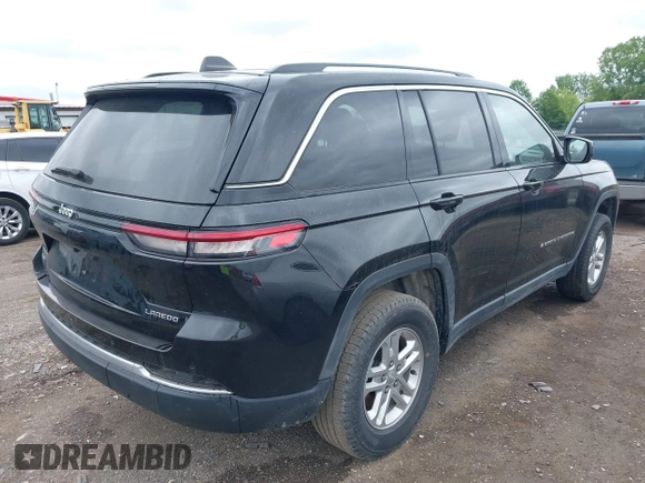 2023 Jeep Grand Cherokee Laredo with VIN 1C4RJHAG0PC640619, listed as a IAAI auction lot 42351031 with 53,507 mi miles and . Bid and sale history available at DreamBid. Image 4.