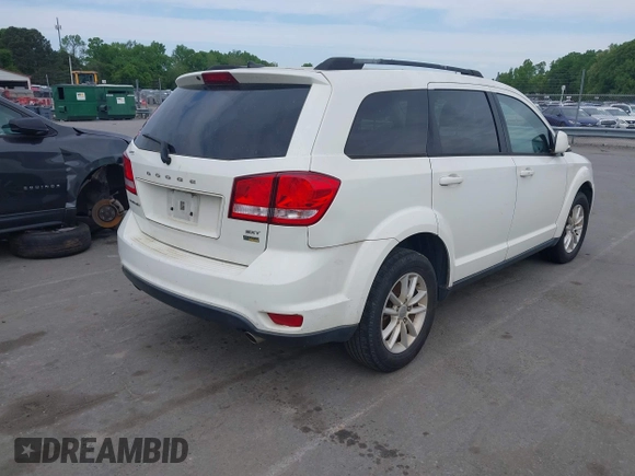 2017 Dodge Journey SXT with VIN 3C4PDCBG4HT572573, listed as a IAAI auction lot 42036006 with 209,854 mi miles and . Bid and sale history available at DreamBid. Image 4.