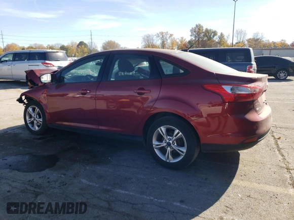 2014 Ford Focus SE with VIN 1FADP3F20EL340123, listed as a Copart auction lot 77626984 with 69,487 mi miles and Salvage Title. Bid and sale history available at DreamBid. Image 2.