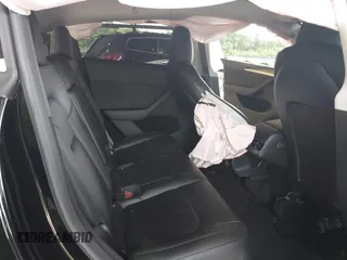 2023 Tesla Model Y Long Range with VIN 7SAYGDEE3PA185778, listed as a IAAI auction lot 39721611 with 11,986 mi miles and . Bid and sale history available at DreamBid. Image 8.