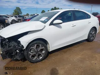 2021 Kia Forte LXS with VIN 3KPF24AD8ME309676, listed as a IAAI auction lot 41687663 with 73,104 mi miles and . Bid and sale history available at carsss.com. Image 2.