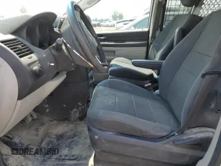 2009 Dodge Grand Caravan with VIN 1D8HN11E99B505784, listed as a Copart auction lot 60590065 with 195,488 mi miles and Salvage title. Bid and sale history available at DreamBid. Image 7.