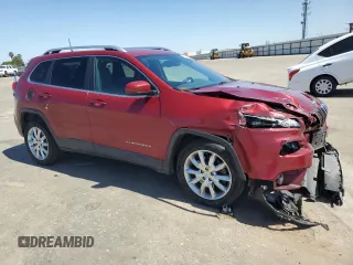 2016 Jeep Cherokee Limited with VIN 1C4PJLDBXGW281885, listed as a Copart auction lot 57126395 with 90,100 mi miles and Salvage title. Bid and sale history available at DreamBid. Image 4.