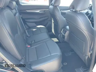 2023 Infiniti QX50 Luxe z VIN 3PCAJ5BA7PF116022, wystawiony jako IAAI lot #42321592 z przebiegiem 18 758 mil mil oraz . Historia ofert i sprzedaży dostępna na DreamBid. Obrazek 8.
