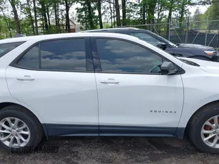 2019 Chevrolet Equinox LS with VIN 2GNAXHEV1K6222437, listed as a IAAI auction lot 42131130 with 50,404 mi miles and . Bid and sale history available at carsss.com. Image 13.