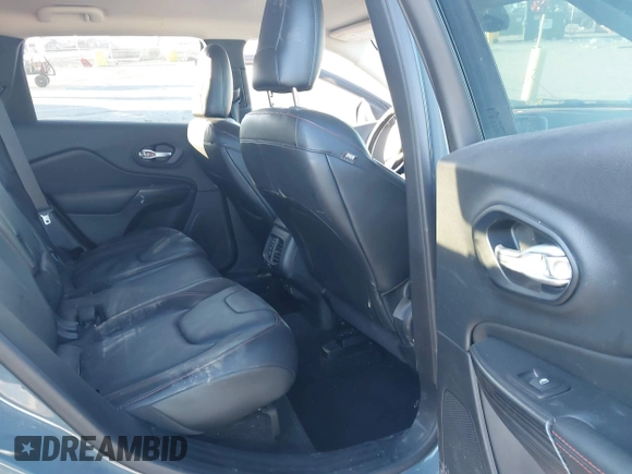 2015 Jeep Cherokee Trailhawk with VIN 1C4PJMBSXFW614416, listed as a IAAI auction lot 41033241 with 112,015 mi miles. Bid and sale history available at carsss.com. Image 8.