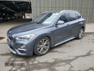 2017 BMW X1 xDrive28i with VIN WBXHT3C32H5F78011, listed as a Copart auction lot 52335215 with 91,275 mi miles and Clean Title. Bid and sale history available at carsss.com. Image 1.