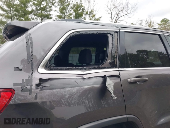 2021 Jeep Grand Cherokee Laredo X with VIN 1C4RJFAG6MC703691, listed as a IAAI auction lot 41655340 with 53,300 mi miles and . Bid and sale history available at DreamBid. Image 6.