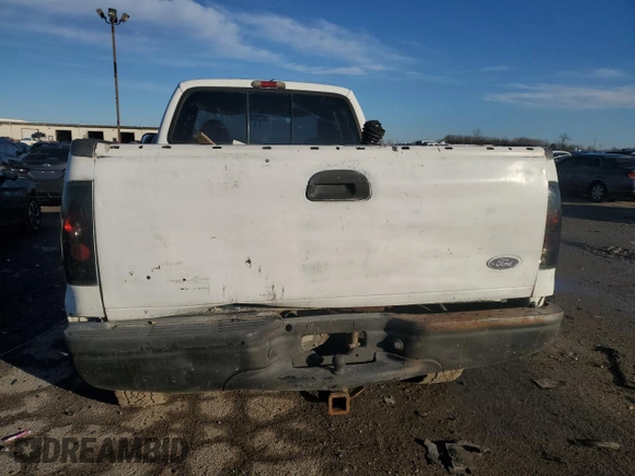 1999 Ford F-250 XL with VIN 1FTNX21S8XEC58955, listed as a Copart auction lot 84917334 with 272,953 mi miles and Salvage title. Bid and sale history available at DreamBid. Image 6.