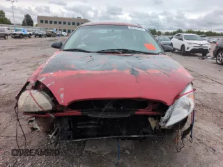 2001 Ford Taurus LX with VIN 1FAFP52UX1A176008, listed as a Copart auction lot 58983935 with 123,985 mi miles and Salvage title. Bid and sale history available at DreamBid. Image 5.