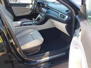 2022 Genesis G70 2.0T z VIN KMTG34TA0NU098580, wystawiony jako IAAI lot #41763511 z przebiegiem 87 816 mil mil oraz . Historia ofert i sprzedaży dostępna na DreamBid. Obrazek 5.
