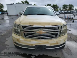 2016 Chevrolet Tahoe LTZ with VIN 1GNSCCKC4GR223339, listed as a Copart auction lot 51135015 with 150,853 mi miles and Salvage title. Bid and sale history available at DreamBid. Image 5.