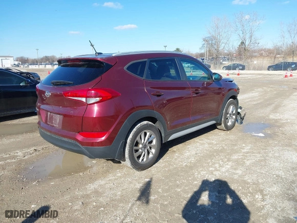 2017 Hyundai Tucson SE Plus with VIN KM8J33A45HU391175, listed as a IAAI auction lot 41803304 with 70,784 mi miles. Bid and sale history available at carsss.com. Image 4.
