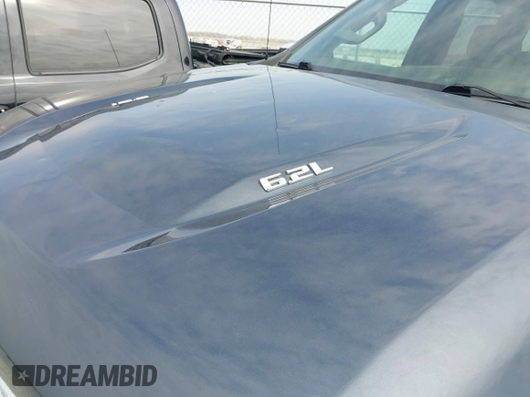 2022 Chevrolet Silverado 1500 LTZ with VIN 1GCUYGEL4NZ187865, listed as a IAAI auction lot 41422797 with 98,524 mi miles and . Bid and sale history available at DreamBid. Image 18.