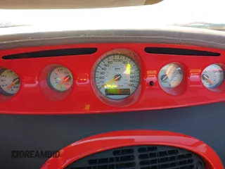 1999 Plymouth Prowler z VIN 1P3EW65G4XV503282, wystawiony jako IAAI lot #41282258 z przebiegiem 58 866 mil mil oraz . Historia ofert i sprzedaży dostępna na DreamBid. Obrazek 7.