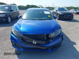 2019 Honda Civic Sport with VIN 19XFC2F83KE014463, listed as a IAAI auction lot 41439533 with 84,379 mi miles and . Bid and sale history available at DreamBid. Image 6.