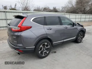 2017 Honda CR-V Touring with VIN 5J6RW2H97HL060219, listed as a Copart auction lot 45497645 with 144,724 mi miles and Salvage Title. Bid and sale history available at carsss.com. Image 3.