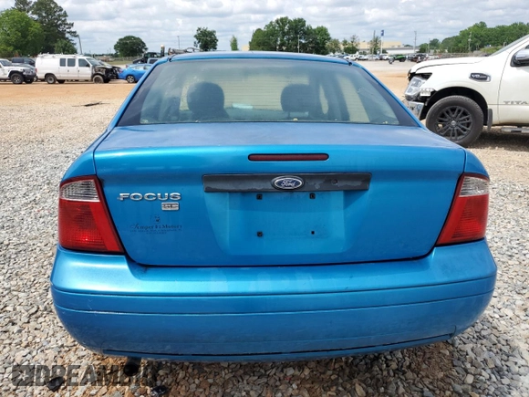 2007 Ford Focus S with VIN 1FAFP34N67W101523, listed as a Copart auction lot 56521835 with 239,505 mi miles and Salvage title. Bid and sale history available at DreamBid. Image 6.