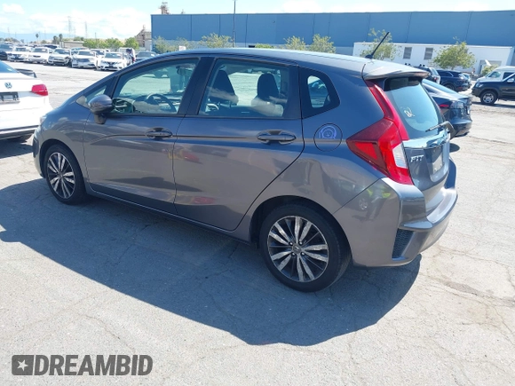2015 Honda Fit EX-L z VIN 3HGGK5H86FM746265, wystawiony jako IAAI lot #42253205 z przebiegiem 75 491 mil mil oraz . Historia ofert i sprzedaży dostępna na DreamBid. Obrazek 3.